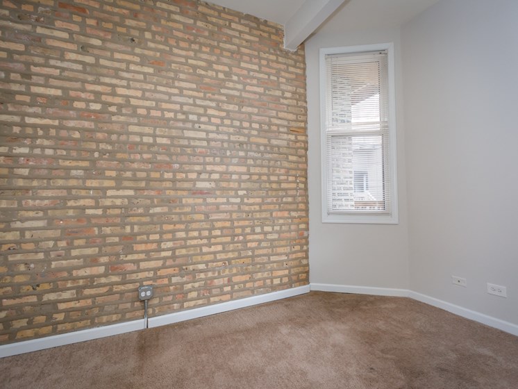 renovated three bedroom apartments with exposed brick